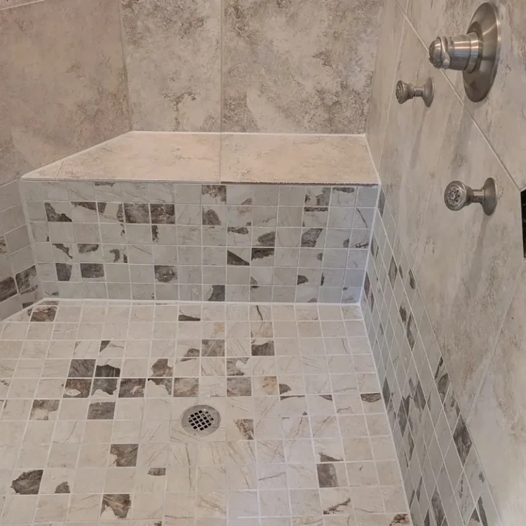 Tiled shower bench with mosaic floor
